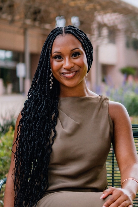 Taylor Montgomery Taylor Montgomery seated outside