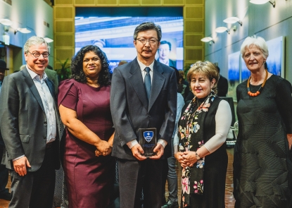 Jiou Wang, (center) the inaugural Walder Foundation Distinguished Professor, stands (L to R) with JHU Trustee Michael Rosenbaum, BMB Department Chair Ashi Weeraratna, Elizabeth Walder, and Dean Ellen MacKenzie.   