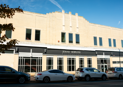 External shot of the 2024 E. Monument St. building.