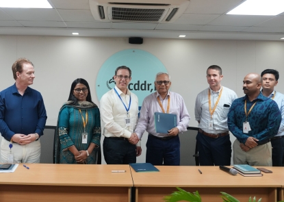 Dr. Judd Walson and Dr. Tahmeed Ahmed shaking hands Dr. Judd Walson and Dr. Tahmeed Ahmed shaking hands